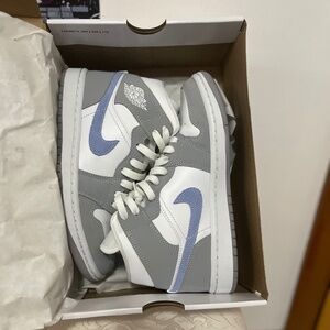 Woman’s Nike Air Jordan 1 Mid in white/aluminum wolf grey